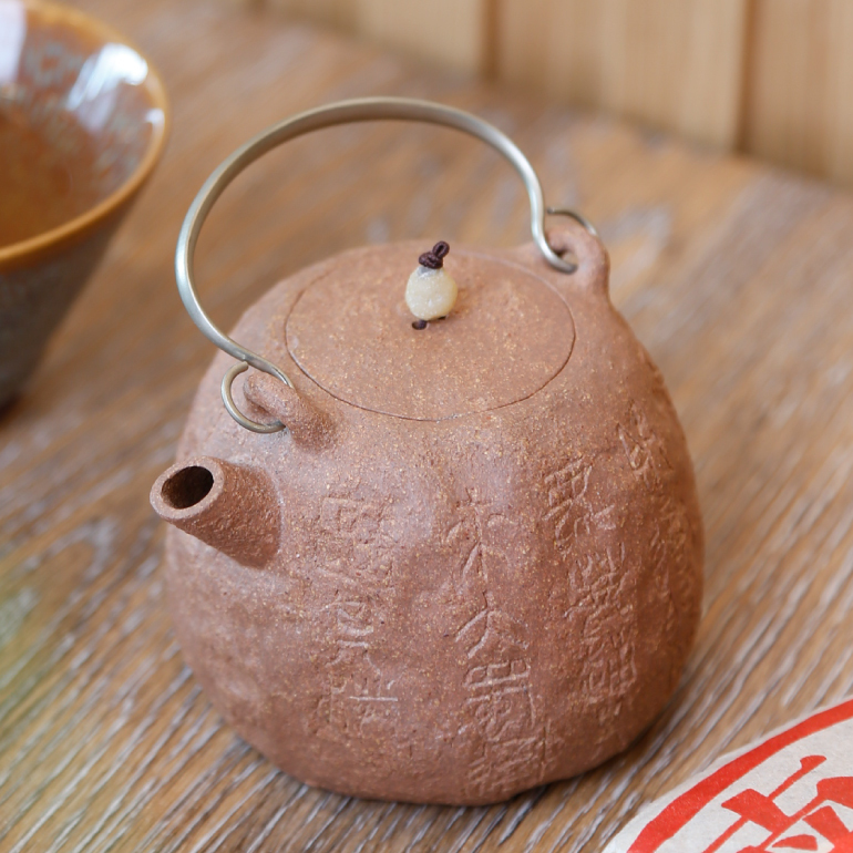 石鼓提梁